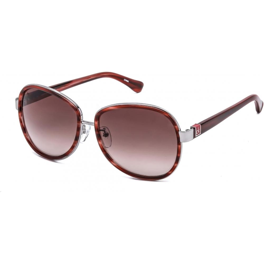

Женские коричневые солнцезащитные очки Calvin Klein 58 мм CK1208SA 004 Гавана