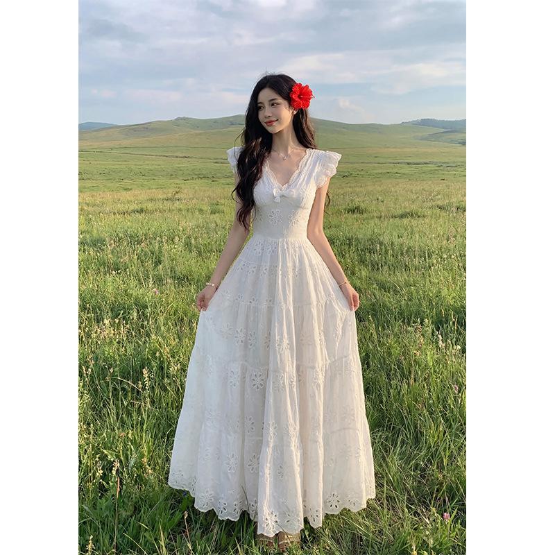 Xinjiang Yunnan tourism seaside vacation yellow long V-neck small flying sleeve waist dress French retro long dress