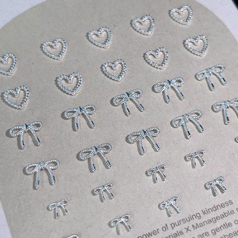 10 st Legering Rosett Kärlek Naglar Konst Berlocker Dekorationer 3D Lyx Metall Silver Rosetter Formade Smycken Diy Manikyr Design Tillbehör