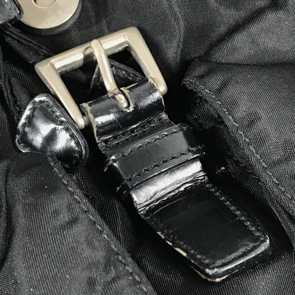 Prada Tasche mit dreieckiger Logo-Platte Rucksack Leder / Nylon Schwarz