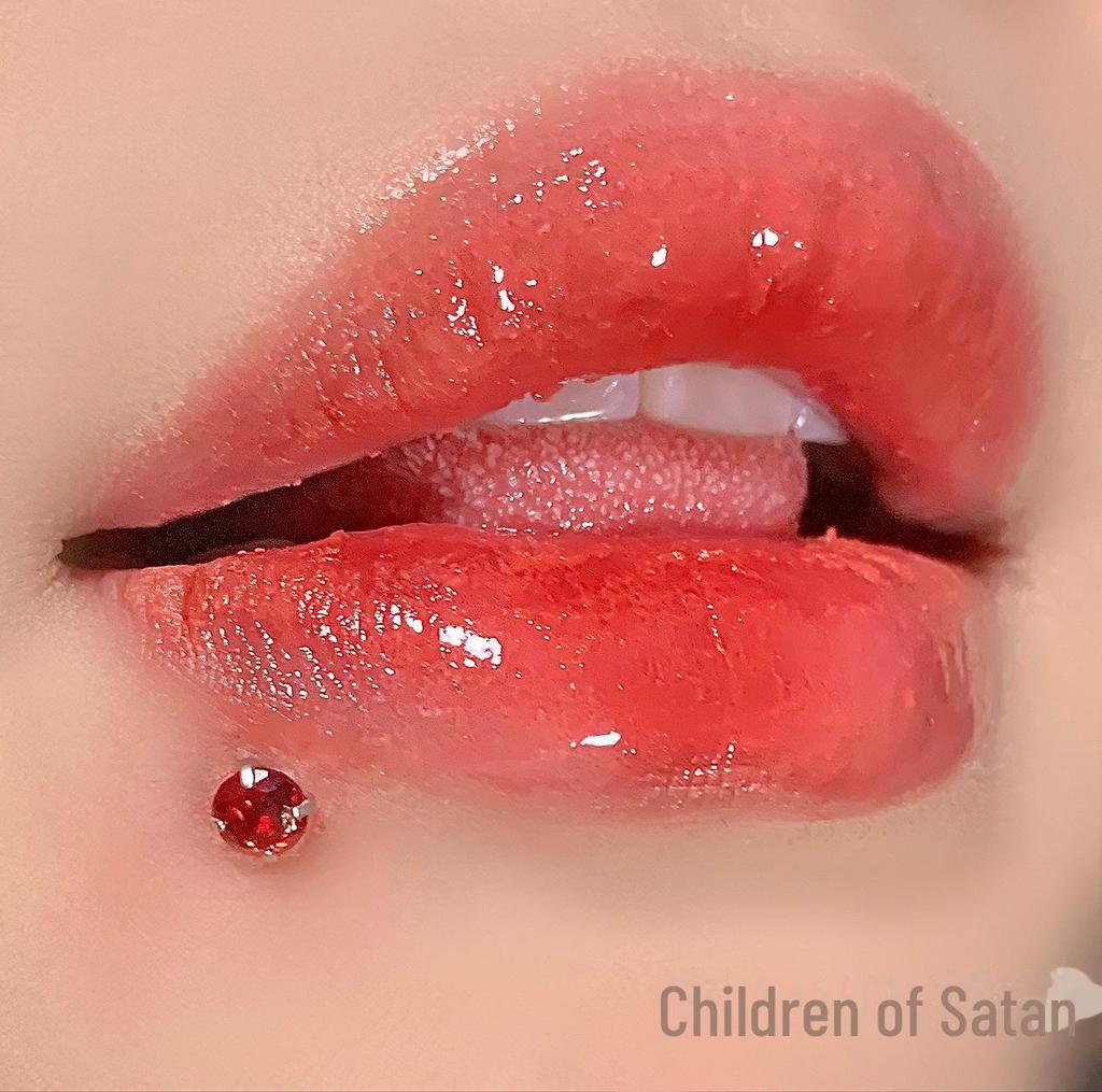'Satan's Child: Luxury Diamond Lip and Ear Studs for Bold Women'