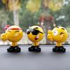 Ha Hu Emoji Bobblehead Car Ornament: Cute Cartoon Interior Decoration.