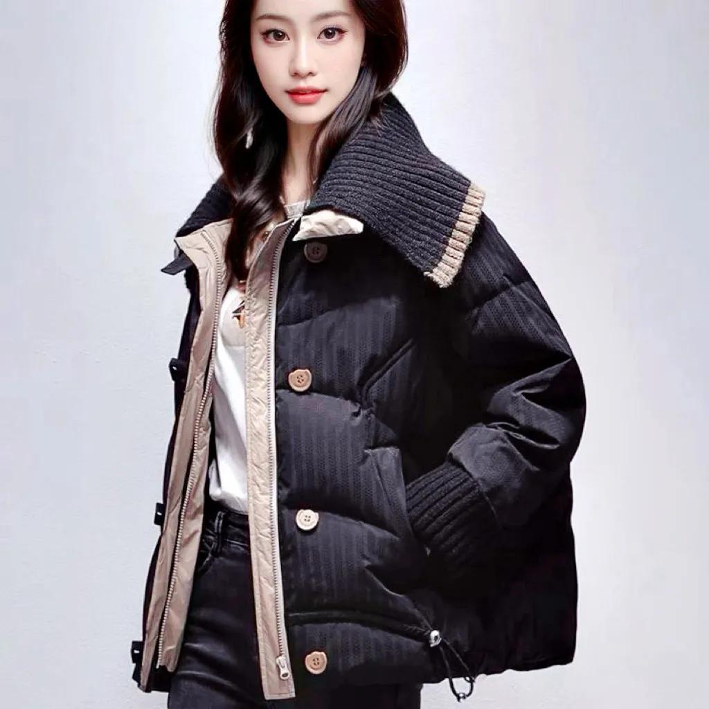 

Женская зимняя куртка свободного кроя с трикотажным воротником и ретро-вставками S чёрный