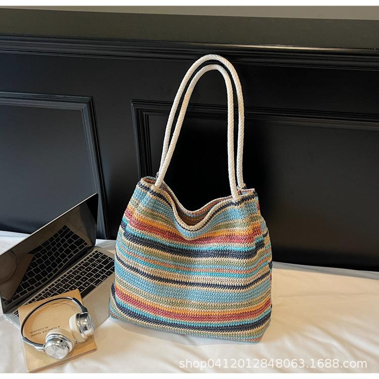 

Portable tote woven bag 2025 new striped contrasting straw bag women s Xia Senmeng trend niche shoulder bag разноцветный