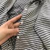 A single-breasted cardigan women's spring, autumn and winter striped polka dot round neck long-sleeved top casual jacket