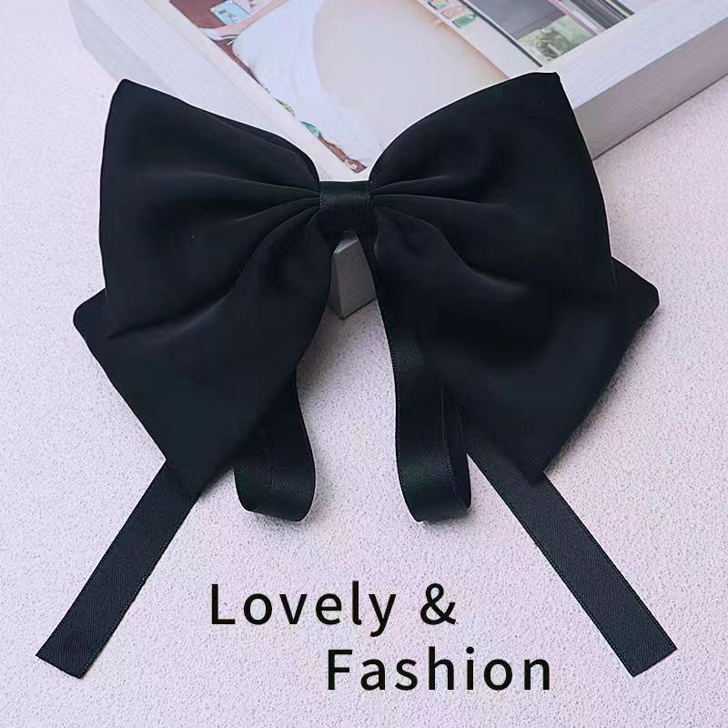 

Корейская атласная розовая заколка-бантик - детский головной убор с пружинным зажимом чёрный