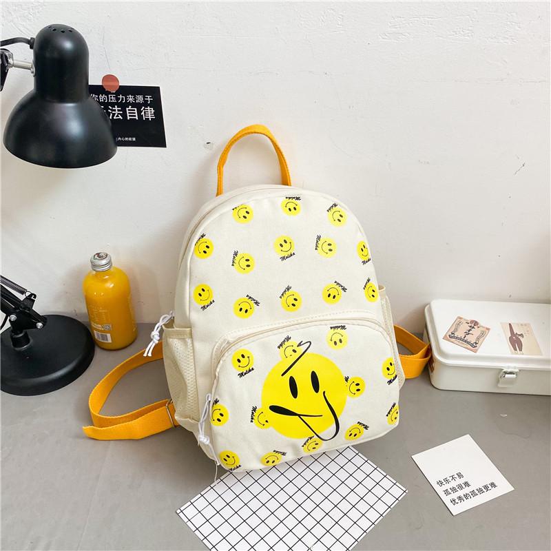 

Adorable Cartoon Smile Children Backpack For Boys And Girls With Spacious Design And Durable Nylon Fabric белый
