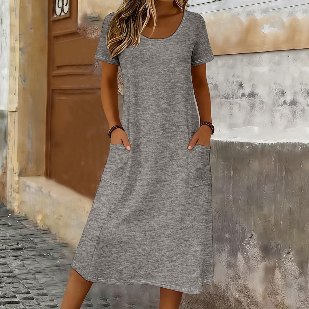 Women Casual Loose Fit Crew Neck Short Sleeve Midi Dress with Pockets Soft Fabric Comfortable Everyday Wear Suitable for Various Occasions