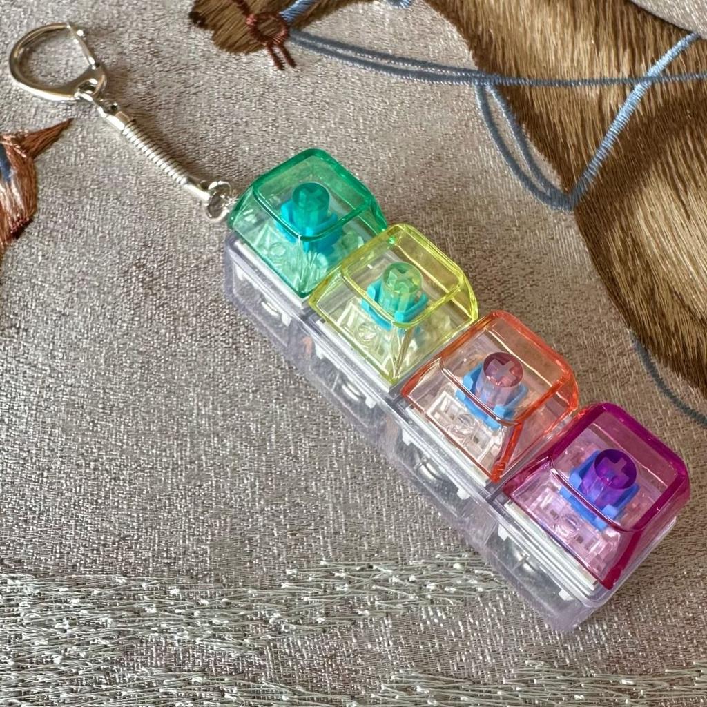 LED Fidget Tastenkappe Spielzeug - Kristall Clicker Sensorisches Spielzeug zur Stressbewältigung Tastatur Schlüsselanhänger Fidget Gadget für Erwachsene Kinder