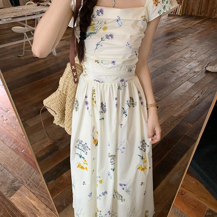 Xiaofei sleeve square neck floral dress children's summer 2026 new seaside vacation coffee break French temperament long dress