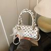 Niche design bag women's 2025 new summer shoulder messenger bag polka dot portable cylinder bag