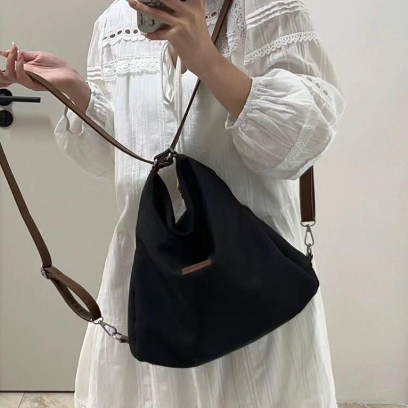 Große Kapazität Modische Canvas-Umhängetasche Damen Freizeit Literatur und Kunst Einfacher einfarbiger Umhängerucksack