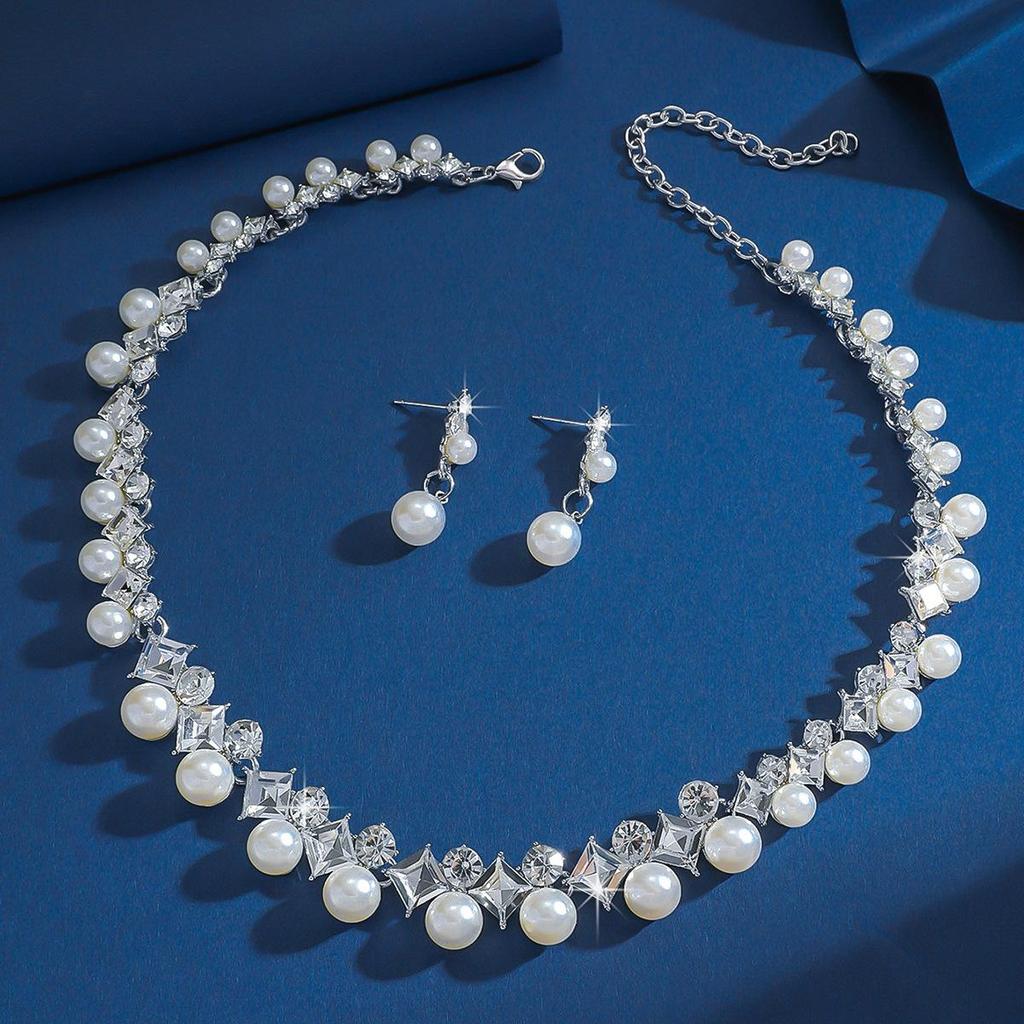 Elegant Pearl Necklace and Earrings Set: Versatile Four-Piece Wedding Jewelry with Tassel and Clavicle Chain