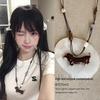 Retro Ethnic Heart Necklace: Wooden Flower Pendant Sweater Chain for Women