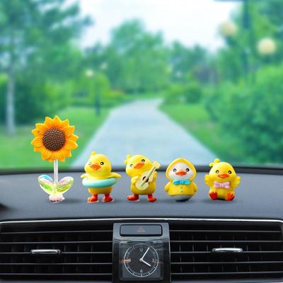 Kreativní roztomilé žluté kachny auto ozdoby: Rozkošné dekorace s motivem bohyně na palubní desku auta.