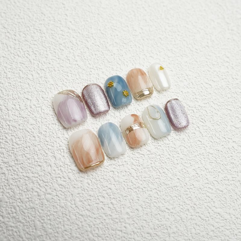 

Handmade wearing nails, hand painted stun dyed purple cat eyes, jumping colors, high-end wearing nail art, finished nail stickers, summer short styles