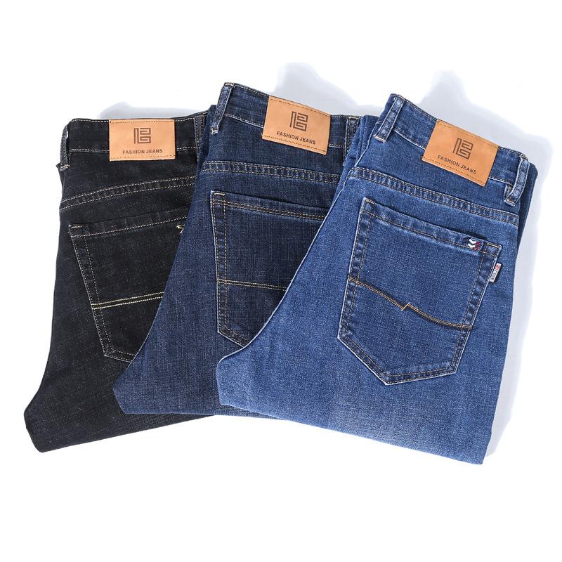 Oversized džíny, pánský volný střih, tlusté pánské oblečení a tlusté strečové kalhoty