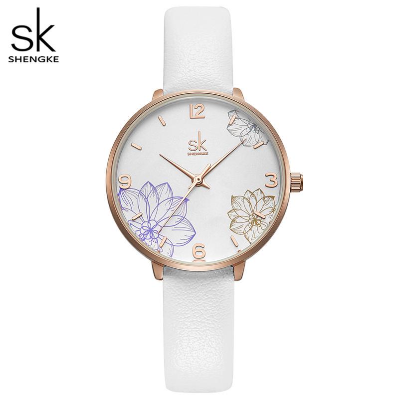 SK Women s Versatile Flower Embossed Leather Strap Quartz Waterproof Watch