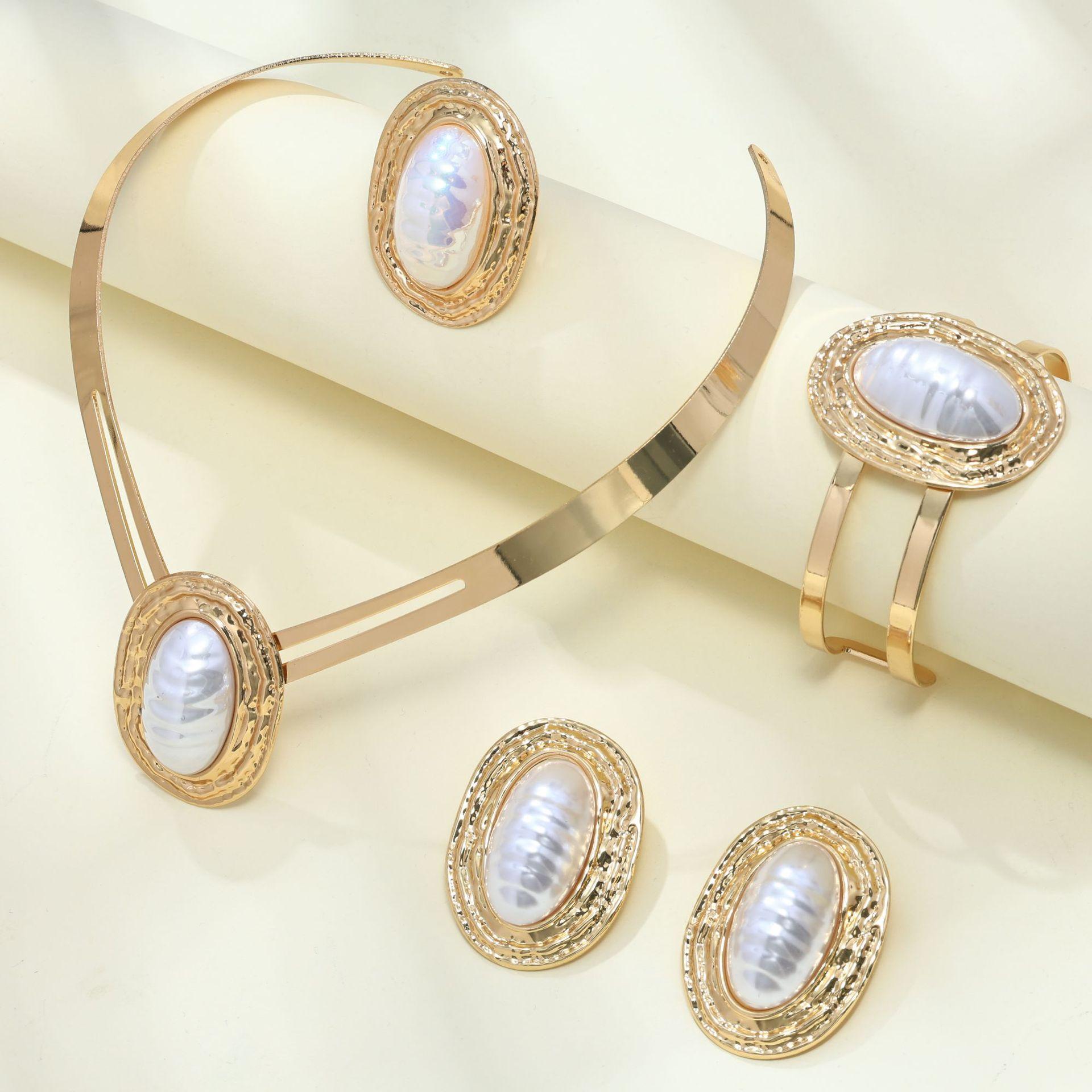 

Овальный золотистый искусственный жемчуг колье серьги браслет кольцо набор женская мода преувеличенные аксессуары подарок