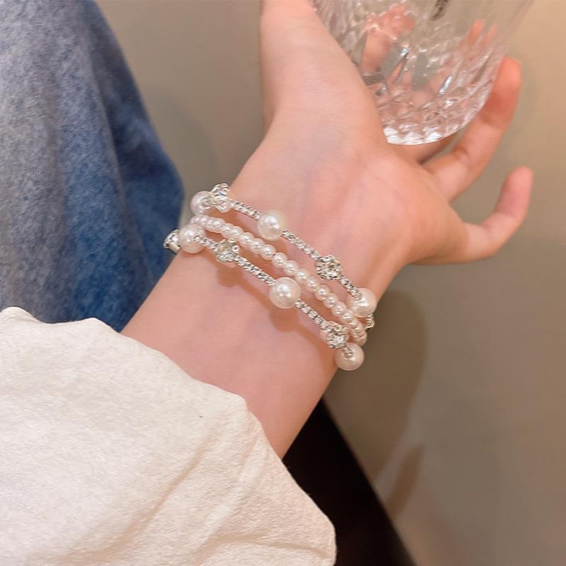 2025 Trendy Pearl Zircon Flower Bow Bracelet: Women's Chic, High-End, Versatile Design