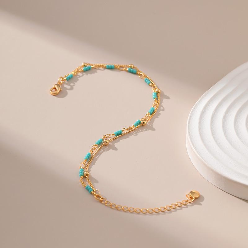 Gold Plated Double Layer Turquoise Color Seed Bead Bracelet With Extension Chain