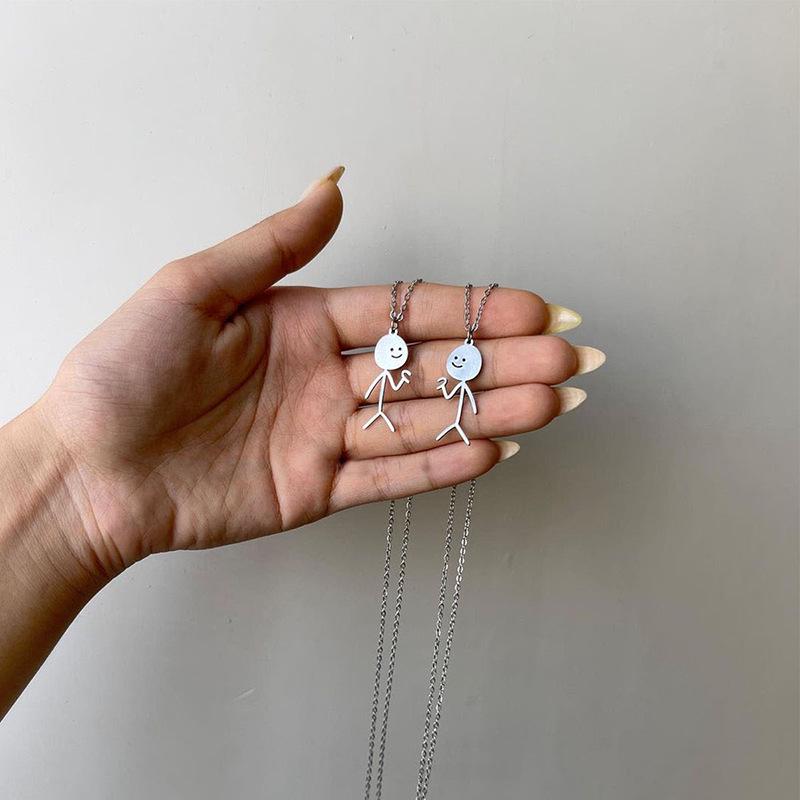 Alloy Little Man Pendant - European & American Cross-border Anime Layered Necklace for Women: High-end Niche Personality & Couple Style