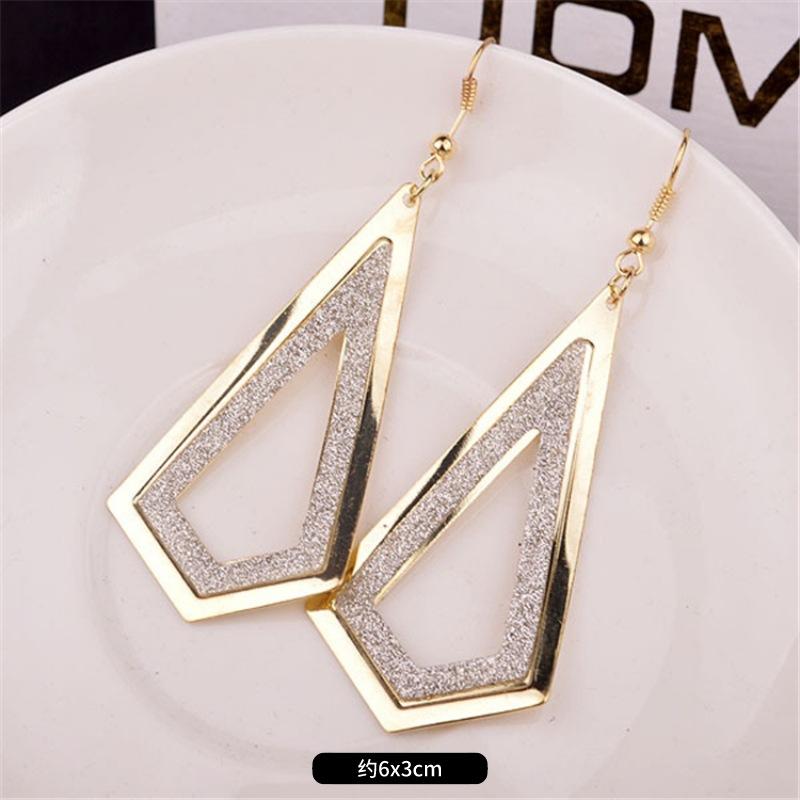 Fashion exaggerated niche temperament fringed earrings retro personality versatile sequined earrings women's long ear jewelry