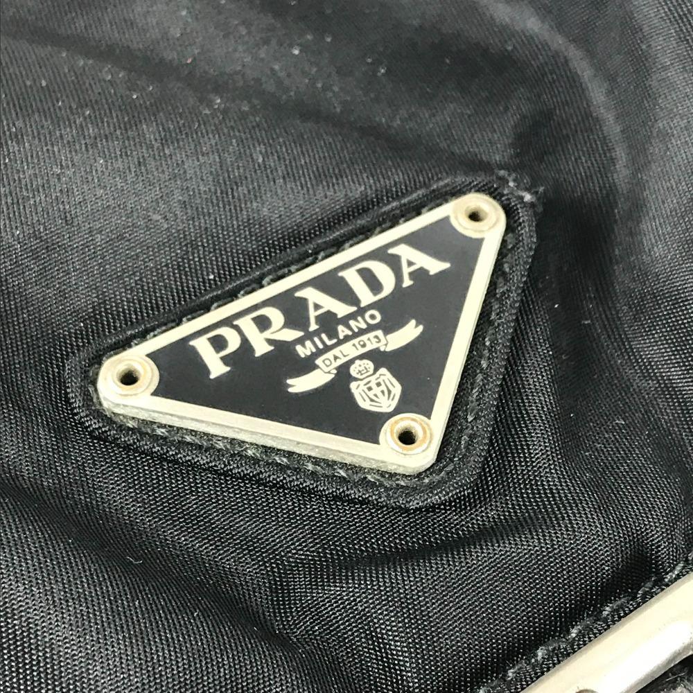 Prada Tasche mit dreieckiger Logo-Platte Rucksack Leder / Nylon Schwarz