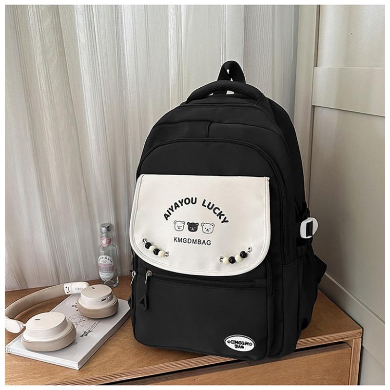 The new schoolbag is high-value, fresh and sweet, candy-colored backpack, contrasting color splicing, and lightweight travel backpack.