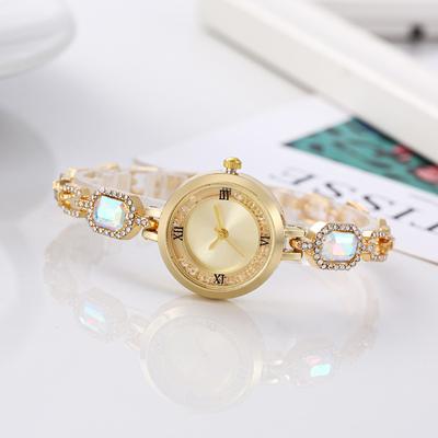 Montres de luxe élégantes pour femmes Bracelet en or Bijoux en ambre Montre-bracelet à quartz Nouvelle mode Rétro Original Montre pour femme