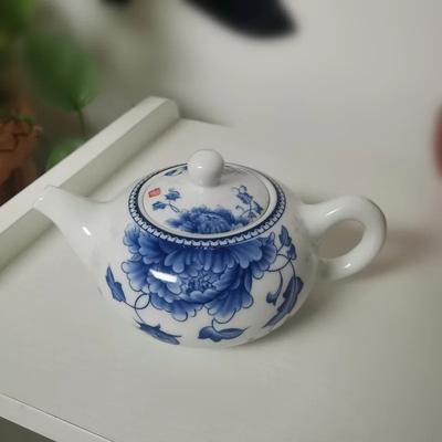 Tetera de porcelana azul y blanca Jingdezhen, juego de té Kungfu chino, tetera de cerámica doméstica para Puer, tetera de servicio, vajilla bonita