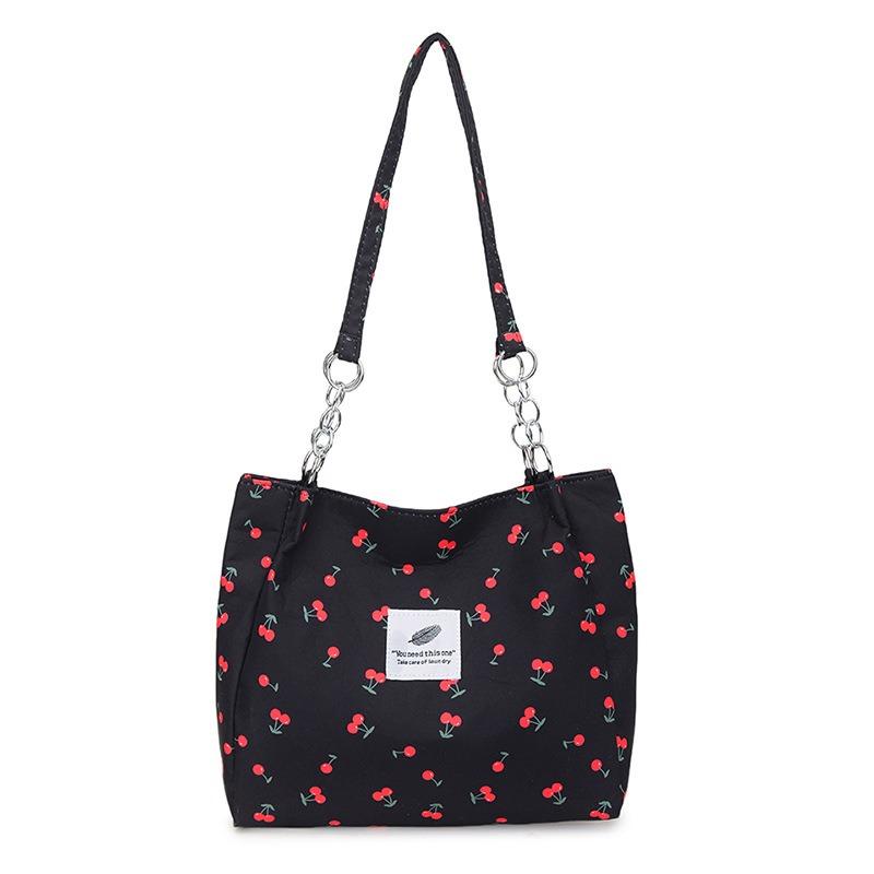 Large capacity niche design shoulder bag, new tote bag, portable women's bag, student shopping bag.