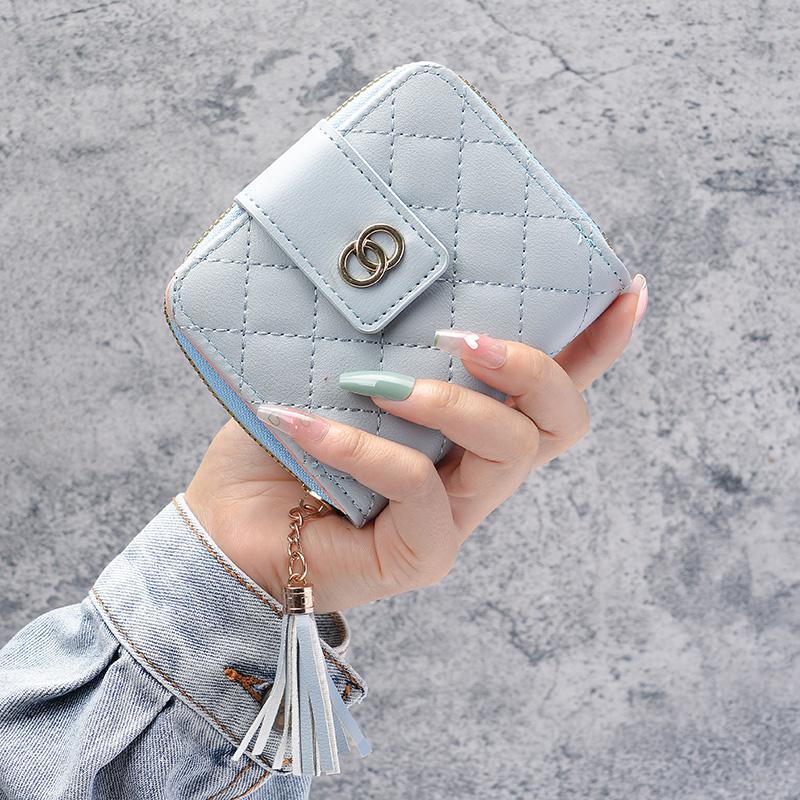 

Новый женский короткий кошелек на молнии, корейская версия вместительной сумки с кисточками, заводское поколение.