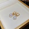 Silver needle zircon butterfly pearl earrings niche design light luxury stud earrings French high-end retro earrings wholesale