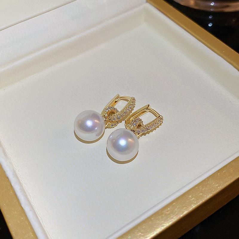 Silver needle zircon butterfly pearl earrings niche design light luxury stud earrings French high-end retro earrings wholesale