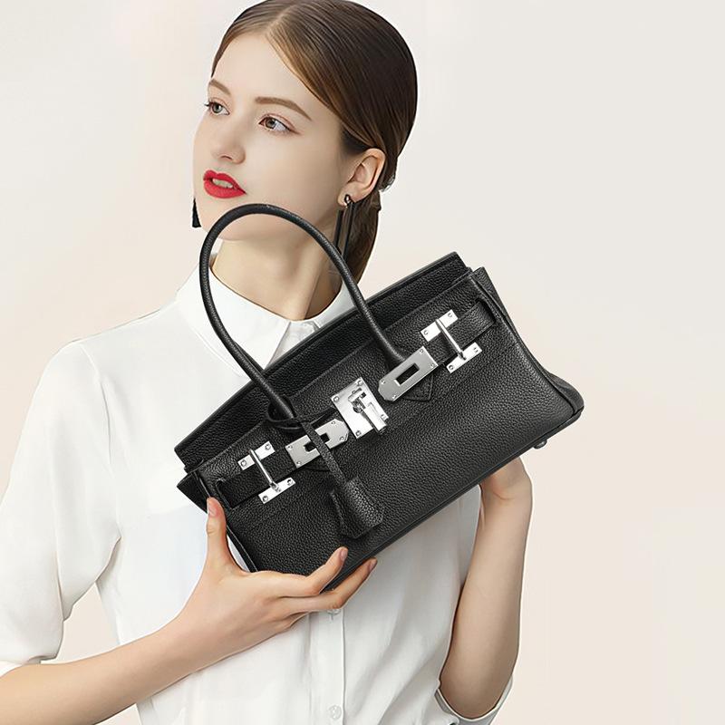 New First-layer Cowhide Fashionable and High-end Handbag, High-quality Long Leather Silver Buckle Portable Platinum Bag for Women