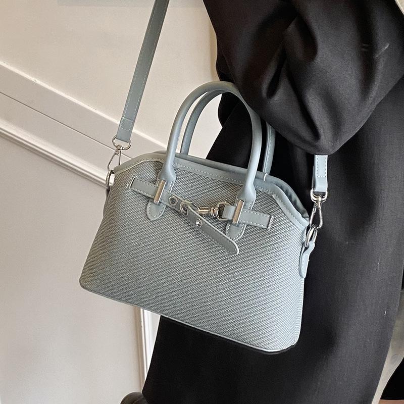 Korean version hot-selling contrasting color casual portable shell bag high-end texture niche commuting fashion versatile messenger bag women