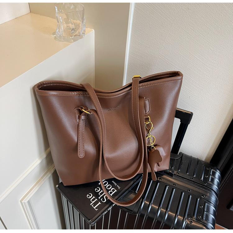 

Сумка большой вместимости женская 2025 новая высококлассная студенческая сумка через плечо для занятий женская портативная дорожная сумка-тоут темно-коричневого