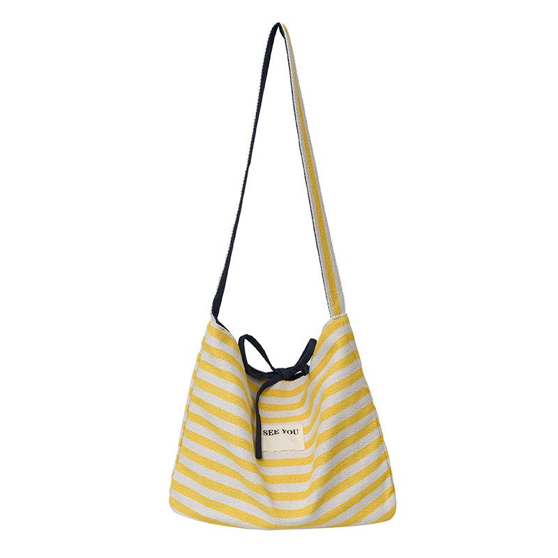 2025 new Korean casual lazy wind contrasting color striped tote bag large-capacity commuter versatile messenger women's bag