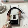 Fashion Poodle Dog Pendant Bracelet Leather Phone Case For Samsung Galaxy Z Flip 4 Z Flip 3 Z Flip Cartoon Bear Hand Chain Cover