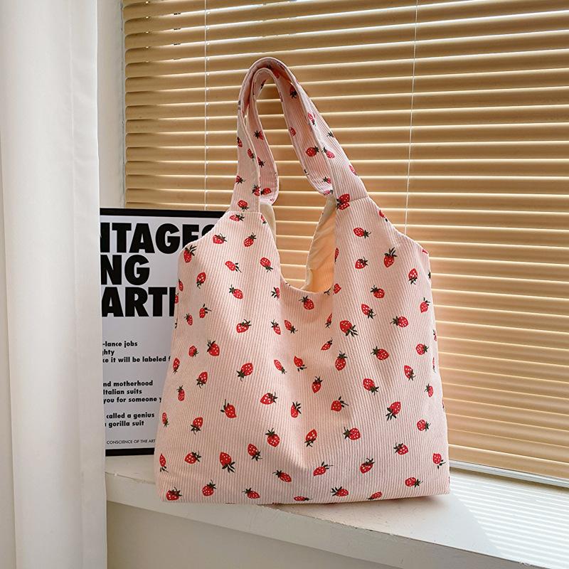 

Versatile corduroy printed tote bag spring new storage bag large capacity shoulder bag women s shopping bag розовый