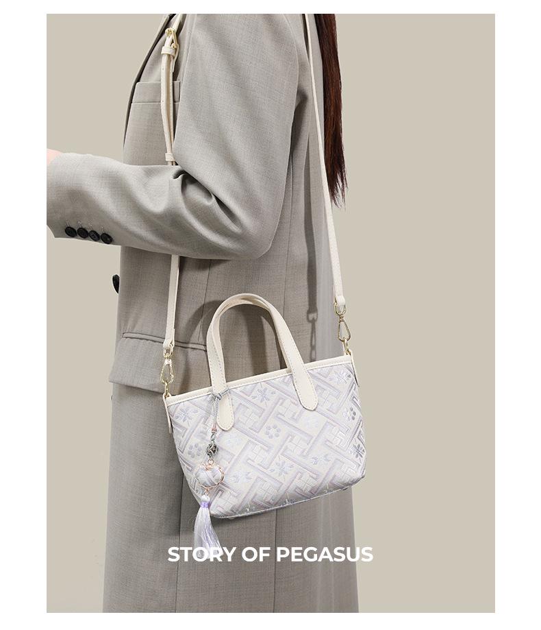 Guangxi Zhuang Brocade Women's Versatile Bag - 2026 High-End, Simple Design, Handheld, Shoulder, Crossbody.