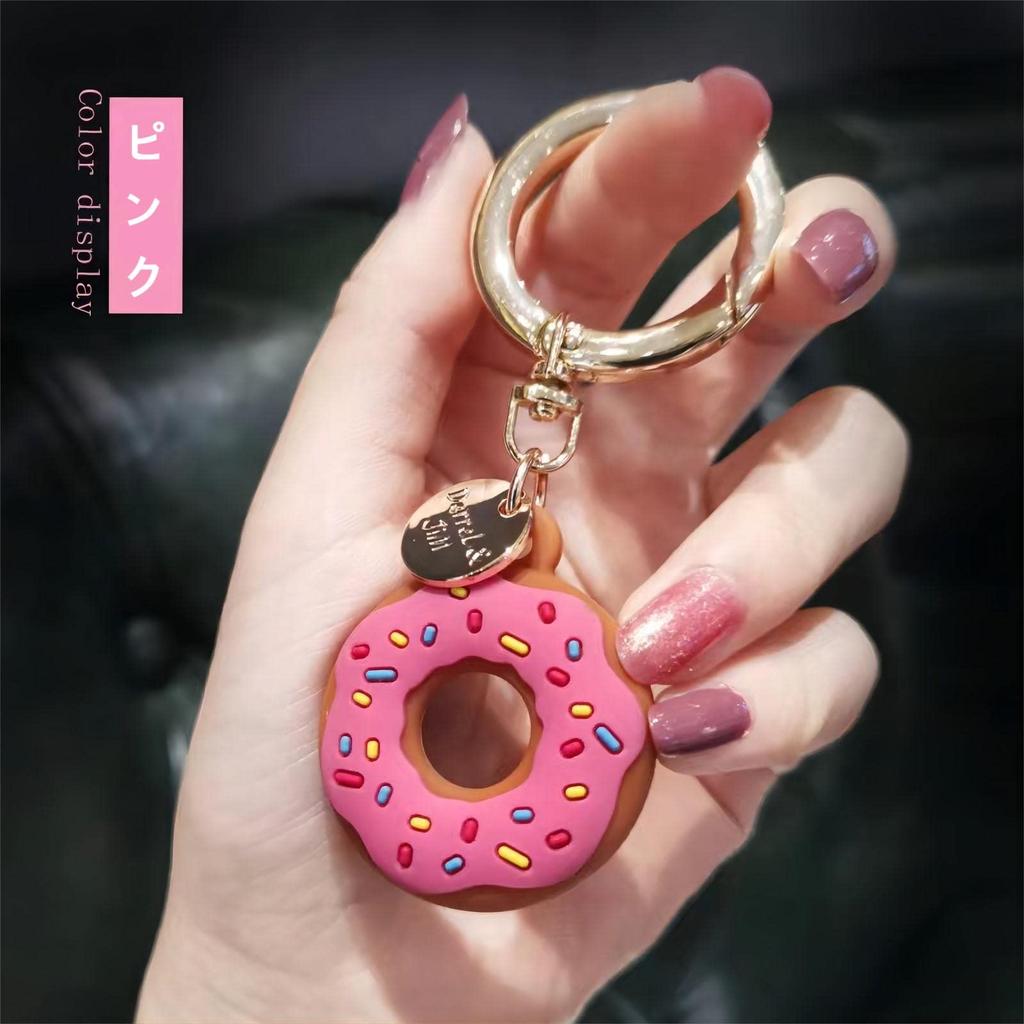 Puzdro kompatibilné s AirTag, MAACKIA 2-dielna súprava, Roztomilý Air Tag Donut, Silikónový kryt, Kľúčenka,