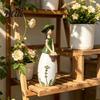 Artistic Tabletop Ornament Nordic Style Resin Girl Figurine with Flower Basket Creative Desktop Unique Interior Design Pieces for Home Decor,