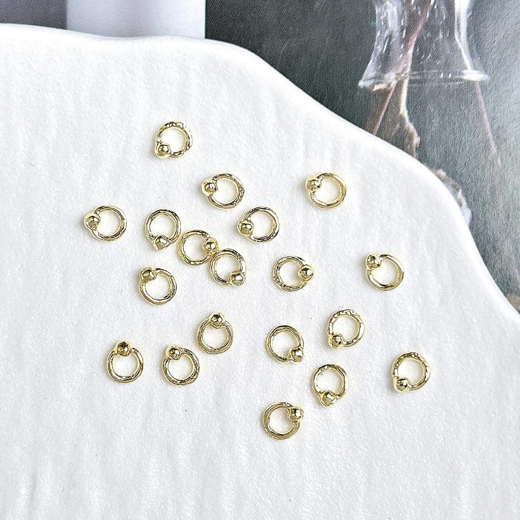 Legierung Gebogener Stab Augenbrauenstecker Außengewinde Doppelseitig Vergoldet Spitzkegel Punk Style Nagelkunst Zubehör DIY Nagel Süß Cool Dekoration DIY