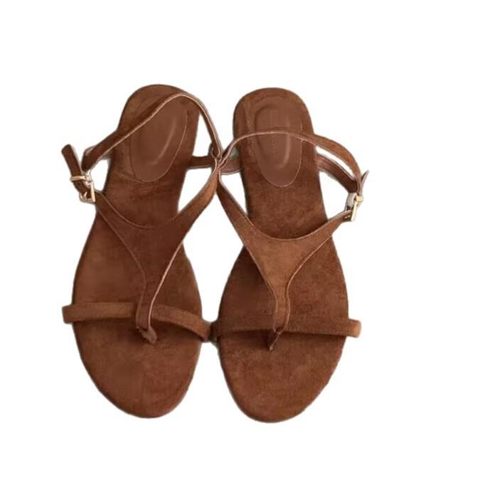 2025 Korean version of summer new fashion versatile toe niche flat sandals women wear beach retro Roman shoes