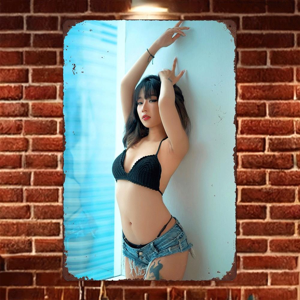 

HD Tin Sign Vintage Tattooed Asian Girl in Bikini Top Denim Shorts Metal Wall Art Retro Decor for Bar Cafe Home 20x30cm（7.8x11.8inch）