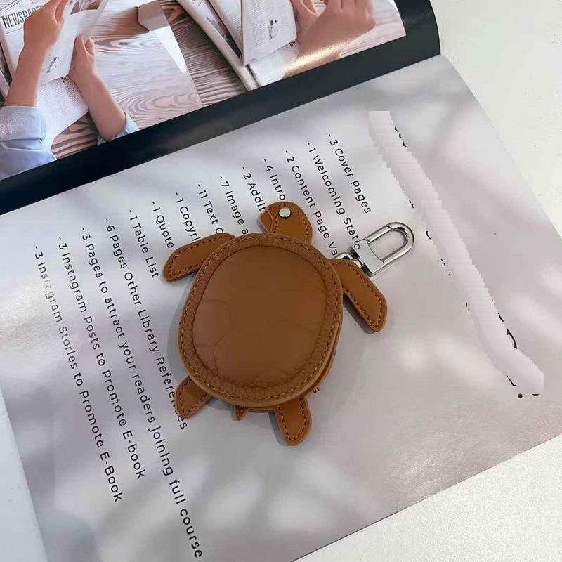 2025 New Leather Pendant Head Layer Leather Mini Earphone Bag Turtle Pendant Wallet Cross Border
