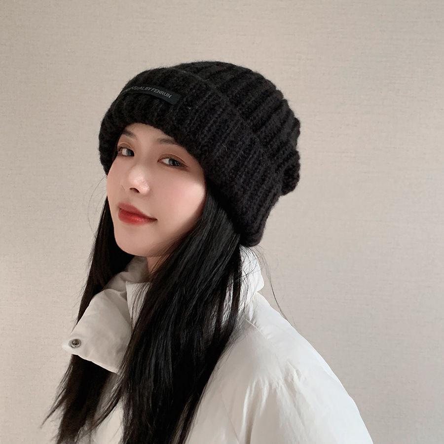 Women's Oversized Wool Beanie: Warm, Stylish, Knitted Hat with Ear Protection for Autumn & Winter.