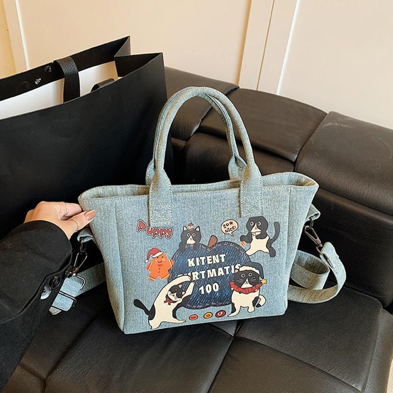 2025 New Trendy Cartoon Cat Print Denim Bucket Bag Versatile Casual Commuter Large Capacity Crossbody Shoulder Bag for Women